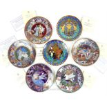 A collection of twenty, boxed plates by Royal Worcester