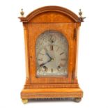 An early 20th century bleached mahogany and line inlaid bracket clock