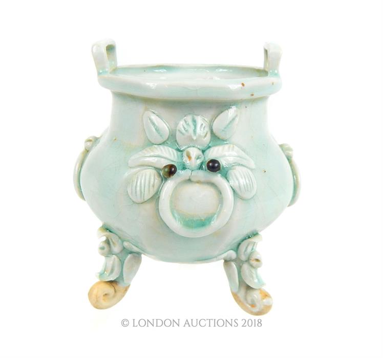 A Chinese, celadon-glazed, incense burner