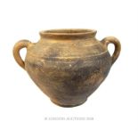 A large, Roman, twin-handled, earthenware vessel (1st - 3rd C AD)