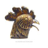 A brass vesta case in the form of a rooster's head