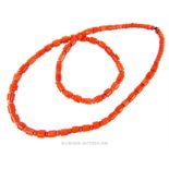 An antique, coral bead necklace