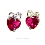 A pair of 9 ct white gold, ruby and diamond stud earrings