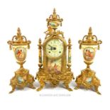 A Continental brass clock garniture