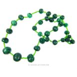 A natural, malachite beaded, graduated necklace