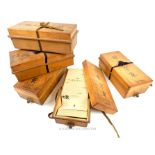 A set of five Meiji period Japanese boxes, containing a large quantity of Japanese cards