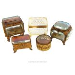 A collection of antique and modern, French, gilt metal and crystal caskets