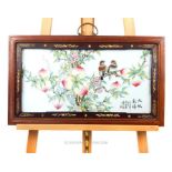 A wooden-mounted, large, Chinese porcelain plaque