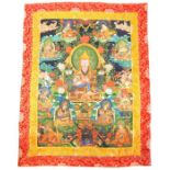 A colourful, Tibetan thangka in silk and cotton