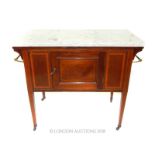 An Edwardian, mahogany washstand with marble top and brass side rails