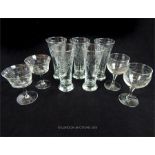 A part set of engraved drinking glasses