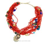 A red- glass and multi-coloured beaded, Eastern necklace with bejewelled drop