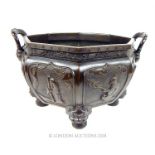 An early 20th century Chinese bronze octagonal planter