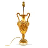 A decorative, gilt, classical-urn, shaped table-lamp with marble base