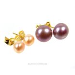 Two, boxed pairs of South Sea pearl earrings with 14 ct yellow gold fittings