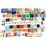 A large collection of various vintage cigarette boxes