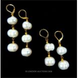 Two pairs of 14 ct yellow gold and natural, baroque, South Sea pearl earrings