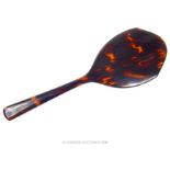 A circa 1920's, tortoiseshell and bevelled glass, hand mirror