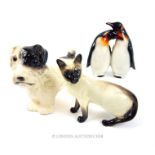 Three ceramic animal figurines to include a Beswick Siamese cat