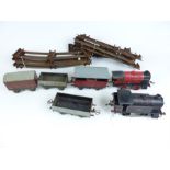 An early 20th century Hornby Meccano 'O'Gauge Clockwork train set.