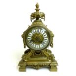 A neoclassical, gilt-metal, balloon-shaped mantle clock