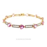 A 9 ct yellow and white gold, bracelet set with diamonds and pink topaz