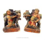 A pair of possibly Tang period carved and painted wooden figures