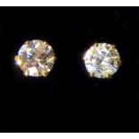 A boxed pair of 18 ct yellow gold, diamond stud earrings (Total 0.10 carats)
