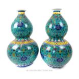 A pair of large Chinese double gourd vases