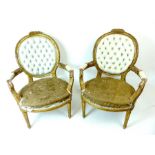 A pair of 19th Century Continental carved giltwood fauteils