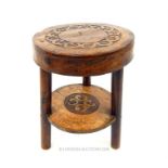 A 17th/18TH CENTURY WALNUT TRIPOD STOOL. The circular top having a band of carved decoration (approx