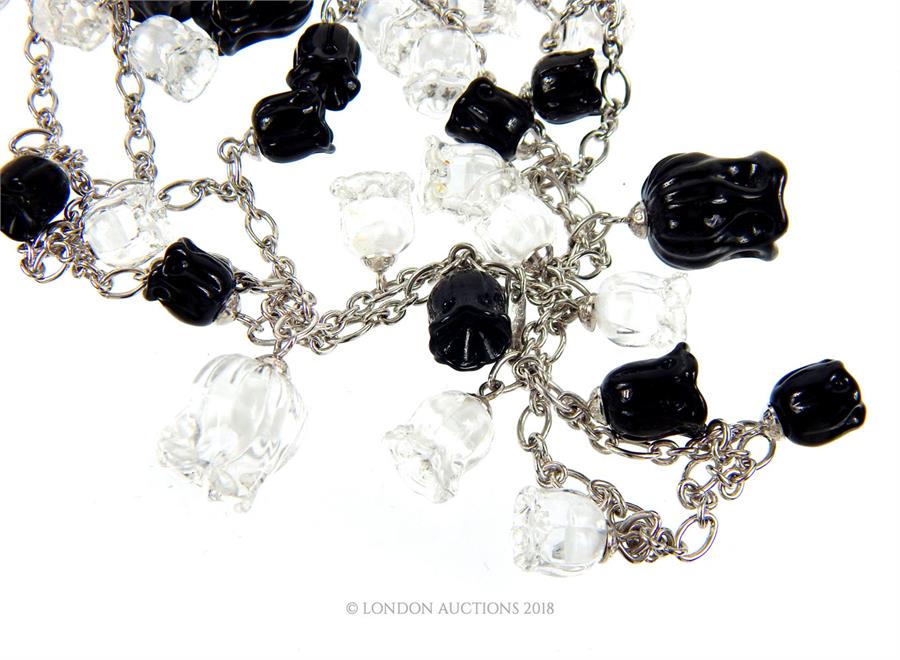 A boxed, Lalique, long, sterling silver, black and clear glass flower necklace - Image 3 of 3