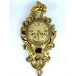 An early 20th century Giltwood and Gesso Cartel Clock.
