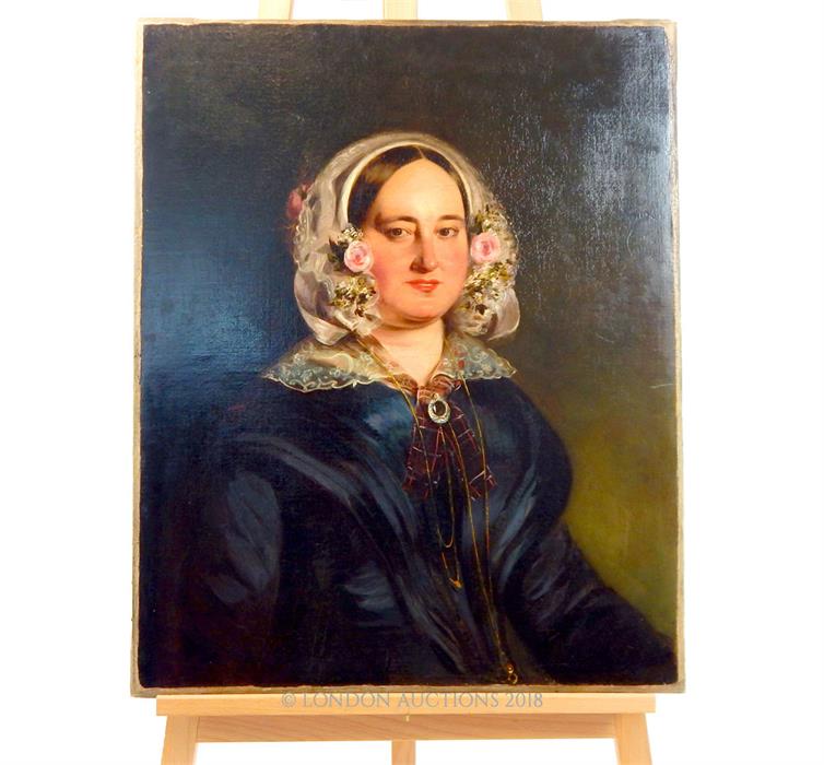 A 19th century oil on canvas portrait of a lady