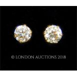 A boxed pair of 18 ct yellow gold, diamond stud earrings (Total 0.20 carats)