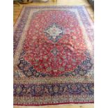 A large antique Persian Kashan carpet
