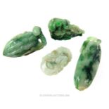 A collection of four Chinese jadeite carvings