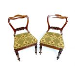 A pair of Regency, rosewood, upholstered chairs