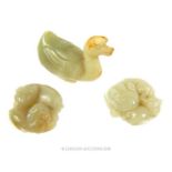 A Chinese jade carving of a duck and two others