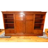 HOLLAND & SONS, A 19TH CENTURY MAHOGANY DWARF LIBRARY BOOKCASE With central panels doors flanked