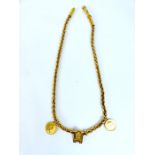 A weighty, 22 ct yellow gold, chain necklace with three pendants