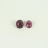 Two, loose, natural, oval-shaped, faceted rubies