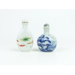 Two Asian Porcelain Snuff Bottles with Lids