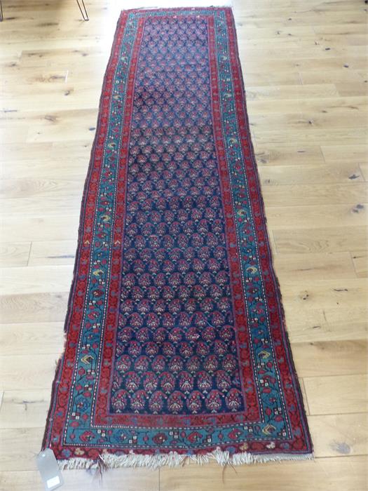 An antique, Caucasian runner