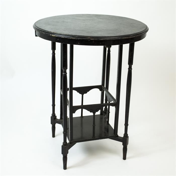 An Edwardian, ebonised, occasional table with circular top