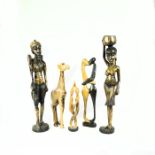 A group of five, tall, African, hand-carved, sculptures