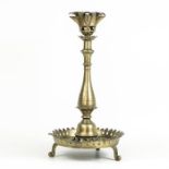 A large 19th century brass candlestick or oil lamp