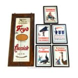 A large, Fry's Chocolate framed mirror and five, framed, Guinness prints