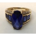 A 10 ct yellow gold, American, sapphire and diamond ring