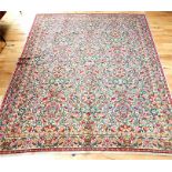 A large, colourful, Persian, woollen carpet